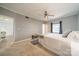 Charming bedroom with ceiling fan, natural light, and neutral decor at 5927 Quail Hollow Rd # H, Charlotte, NC 28210