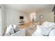 Comfortable living room with light wood flooring and plush seating, complemented by a dining area in view at 5927 Quail Hollow Rd # H, Charlotte, NC 28210