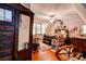 Bedroom with floral wallpaper, hardwood floors, and a ceiling fan at 611 E Marion St, Shelby, NC 28150