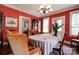 Charming dining room with traditional decor, chandelier lighting, and ample natural light at 611 E Marion St, Shelby, NC 28150