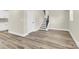 Finished basement boasts wood-look flooring and a staircase at 6328 Beecher Dr, Charlotte, NC 28215