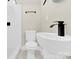 Modern bathroom featuring sleek fixtures, tiling, and a stylish vanity at 6328 Beecher Dr, Charlotte, NC 28215