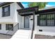 Inviting front entrance featuring a painted door, covered entry, and freshly painted steps at 6328 Beecher Dr, Charlotte, NC 28215