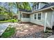 View of the backyard featuring a brick patio area at 636 N Center St, Statesville, NC 28677