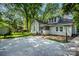 Back exterior with a fenced yard and patio, offering privacy and space at 636 N Center St, Statesville, NC 28677
