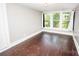 Bedroom with hardwood floors and ample natural light at 636 N Center St, Statesville, NC 28677