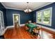 Spacious dining room featuring hardwood floors, natural light, and an open layout at 636 N Center St, Statesville, NC 28677