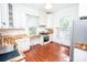 Well-lit kitchen featuring stainless steel appliances, wooden countertops, and white cabinetry at 636 N Center St, Statesville, NC 28677