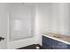 Clean bathroom featuring a shower-tub combo and modern vanity at 6782 Kingfisher Ct, Denver, NC 28037