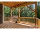 New wooden deck overlooking a green forest at 6782 Kingfisher Ct, Denver, NC 28037