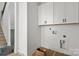 Bright laundry room with upper cabinets at 6782 Kingfisher Ct, Denver, NC 28037