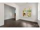 Bright living room with hardwood floors, large window and natural light at 6782 Kingfisher Ct, Denver, NC 28037