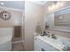 Neutral toned bathroom featuring a combination tub and shower, a large mirror, and good lighting at 785 Sanside Dr, York, SC 29745