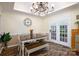 Inviting dining room with natural lighting, decorative chandelier, and views of the backyard at 785 Sanside Dr, York, SC 29745