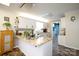 Bright kitchen featuring white cabinets, granite countertops, and modern appliances at 785 Sanside Dr, York, SC 29745