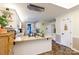 Well-lit kitchen with granite countertops, white cabinetry, and open layout at 785 Sanside Dr, York, SC 29745