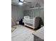Neutral Bedroom with a white crib and decorative script on the wall at 800 Charles Rd, Shelby, NC 28150