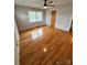 Spacious bedroom with wood floors, window with blinds, and a ceiling fan at 800 Charles Rd, Shelby, NC 28150