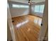 Bright bedroom with hardwood floors, two windows, and a ceiling fan at 800 Charles Rd, Shelby, NC 28150