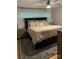 Bedroom with a large bed with decorative pillows and a ceiling fan at 800 Charles Rd, Shelby, NC 28150