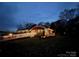 Charming brick home exterior at dusk, featuring a landscaped yard and inviting facade at 800 Charles Rd, Shelby, NC 28150