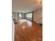 Spacious living room with hardwood floors, a fireplace, and an abundance of natural light at 800 Charles Rd, Shelby, NC 28150