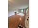 Bright living room featuring a decorative fireplace, wood floors and a large window at 800 Charles Rd, Shelby, NC 28150