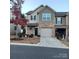Charming two-story townhome with brick facade and attached one-car garage at 8039 Scarlet Oak Ter, Fort Mill, SC 29707