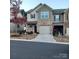 Charming townhome with a brick facade, a one car garage, and well-maintained landscaping at 8039 Scarlet Oak Ter, Fort Mill, SC 29707