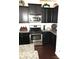 Modern kitchen featuring stainless steel appliances and granite countertops at 8039 Scarlet Oak Ter, Fort Mill, SC 29707