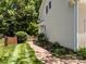 Home exterior with walkway landscaping and fenced yard at 8441 Sandowne Ln, Huntersville, NC 28078