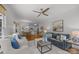 Open living space with a seamless flow between the living, dining, and kitchen areas at 8441 Sandowne Ln, Huntersville, NC 28078