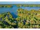 Breathtaking aerial view of a lakeside community surrounded by lush greenery and tranquil water features at 9002 Fair Oak Dr, Sherrills Ford, NC 28673