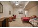 Bedroom with neutral walls and carpet, featuring a desk, a bed, and closet at 9002 Fair Oak Dr, Sherrills Ford, NC 28673