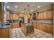 Spacious kitchen boasting granite countertops, custom cabinetry, and a center island with wine storage at 9002 Fair Oak Dr, Sherrills Ford, NC 28673