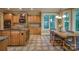 Charming kitchen with custom wood cabinetry, granite countertops, and an adjacent breakfast nook at 9002 Fair Oak Dr, Sherrills Ford, NC 28673