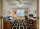 Office with a futon, ceiling fan, and a large desk at 9002 Fair Oak Dr, Sherrills Ford, NC 28673