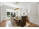 Stylish dining room with chandelier and natural light at 9104 Kingsmead Ln, Waxhaw, NC 28173