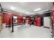 Custom garage features an automotive car lift at 9104 Kingsmead Ln, Waxhaw, NC 28173