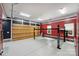Spacious garage with a car lift at 9104 Kingsmead Ln, Waxhaw, NC 28173