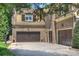 Exterior of garage with basketball hoop at 9104 Kingsmead Ln, Waxhaw, NC 28173