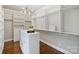 Spacious walk-in closet with custom shelving and storage at 9104 Kingsmead Ln, Waxhaw, NC 28173
