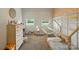 Cozy bedroom features a playful design, with wainscotting and a unique house frame bed and mini hammock at 103 W Sunset Dr, Locust, NC 28097