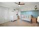 Charming Bedroom with a crib, dresser, and closet space, designed with soothing colors at 103 W Sunset Dr, Locust, NC 28097