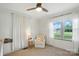 Bright bedroom with natural light, ceiling fan and neutral decor at 103 W Sunset Dr, Locust, NC 28097