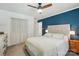 Serene main bedroom with a neutral color palette, ceiling fan, and closet at 103 W Sunset Dr, Locust, NC 28097