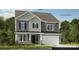 Charming two-story home with shake and horizontal siding, complemented by stone accents on the facade at 108 Goorawing Ln, Mooresville, NC 28115