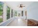 Bright sunroom with large windows offering ample natural light and views of the surrounding landscape at 119 Oak Ave, Shelby, NC 28152