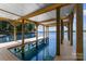 Covered boat slip featuring access into clear lake water at 138 Lakefront Dr, Mooresville, NC 28117