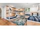 Spacious bunk room featuring custom built-in bunk beds and a stylish area rug at 138 Lakefront Dr, Mooresville, NC 28117